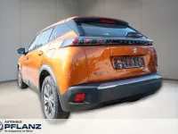 Gebraucht Peugeot e-2008 Active 100 kW (136 PS) 2022 Orange SUV