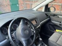 Second-hand VW Sharan 140 CP (102 kW) 2012 Negru Monovolum