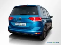 Gebraucht VW Touran Active 150 PS (110 kW) 2023 Caribbean blue metallic Van / Kleinbus