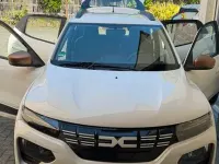 Gebraucht Dacia Spring Extreme 47 kW (65 PS) 2023 Weiß Kleinwagen