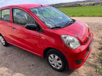 Gebraucht Daihatsu Cuore 69 PS (50 kW) 2011 Rot Kleinwagen