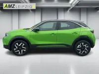 Gebraucht Opel Mokka Elegance 136 PS (100 kW) 2023 Matcha green/ikone gruen SUV