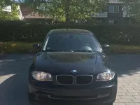 Gebraucht BMW 116 122 PS (89 kW) 2009 Schwarz Kleinwagen