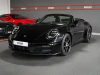 Gebraucht Porsche 911 Carrera Chrono 394 PS (289 kW) 2024 Tiefschwarzmetallic Cabrio