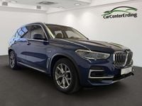 Gebraucht BMW X5 398 PS (292 kW) 2021 Phytonicblau metallic SUV