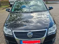 Second-hand VW Passat Sportline 160 CP (117 kW) 2009 Negru Break