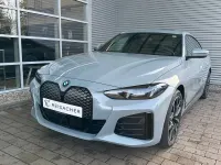 Gebraucht BMW i4 Comfort Edition 250 kW (340 PS) 2026 M brooklyn grau metallic Limousine