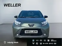 Gebraucht Toyota Aygo 72 PS (52 kW) 2023 Cardamon green / night sky black (gruen) Kleinwagen