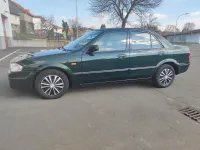 Usata Mazda 323 88 CV (64 kW) 1998 Verde Berlina