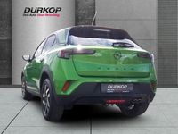 Gebraucht Opel Mokka GS Line 131 PS (96 kW) 2024 Lackierung matcha green/typ au SUV