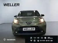 Gebraucht Toyota Aygo 72 PS (52 kW) 2022 Cardamon green / night sky black (gruen) Kleinwagen
