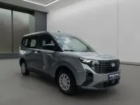 Gebraucht Ford Tourneo 125 PS (91 kW) 2024 Silber / solarsilber (metallic) Kombi