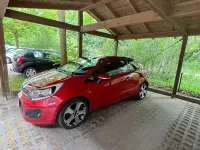 Gebraucht Kia Rio 109 PS (80 kW) 2012 Rot Limousine