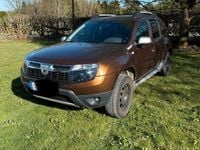 Second-hand Dacia Duster 105 CP (77 kW) 2011 Maro SUV