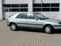Gebraucht Mazda 323 88 PS (64 kW) 1991 Grün Limousine
