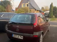Używany Opel Corsa Elegance 75 KM (55 kW) 2002 Czerwony Hatchback