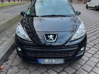 Gebraucht Peugeot 207 95 PS (69 kW) 2011 Schwarz Kombi