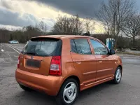 Używany Kia Picanto 65 KM (47 kW) 2004 Pomarańczowy Hatchback