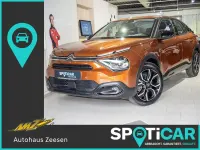Gebraucht Citroën e-C4 Feel 100 kW (136 PS) 2022 Karamellbraun (metallic) Limousine