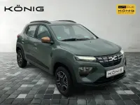 Gebraucht Dacia Spring Extreme 47 kW (65 PS) 2023 Olivgrün Kleinwagen