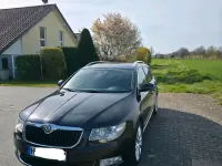 Używany Skoda Superb Elegance 170 KM (125 kW) 2012 Czarny Kombi