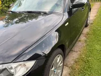 Gebraucht BMW 116 122 PS (89 kW) 2010 Schwarz Kleinwagen