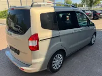 Gebraucht Ford Tourneo Courier Trend 101 PS (74 kW) 2014 Silber Van / Kleinbus