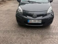Gebraucht Toyota Aygo 68 PS (50 kW) 2011 Schwarz Kleinwagen