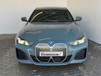 Gebraucht BMW i4 M Sport 294 kW (401 PS) 2025 Cape york grün met. Limousine