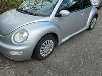 Second-hand VW New Beetle 115 CP (84 kW) 2000 Argintiu Hatchback