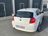 Gebraucht BMW 116 Advantage 122 PS (89 kW) 2011 Weiß Kleinwagen