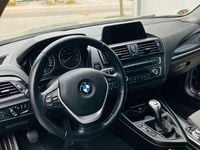 Second-hand BMW 116 Efficient Dynamics 116 CP (85 kW) 2013 Negru Hatchback