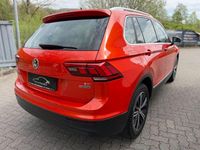 Second-hand VW Tiguan Sound 150 CP (110 kW) 2017 Portocaliu SUV