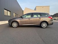 Używany Ford Focus Titanium 116 KM (85 kW) 2011 Brązowy Kombi
