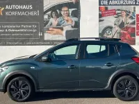 Gebraucht Dacia Sandero Expression 91 PS (66 kW) 2024 Grün (metallic) Kleinwagen