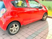 Gebraucht Chevrolet Spark 68 PS (50 kW) 2010 Rot Kleinwagen