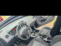 Gebraucht Peugeot 308 95 PS (69 kW) 2010 Schwarz Kombi