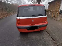 Gebraucht Peugeot 1007 Premium 73 PS (53 kW) 2006 Rot Van / Kleinbus