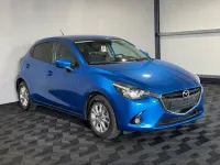 Używany Mazda 2 Exclusive-Line 105 KM (77 kW) 2015 Niebieski Sedan/Limuzyna