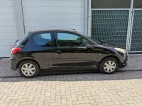Gebraucht Peugeot 206+ 75 PS (55 kW) 2010 Schwarz Kleinwagen