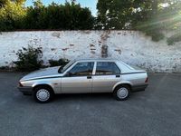 Gebraucht Alfa Romeo 75 110 PS (80 kW) 1989 Silber Limousine