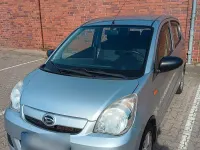 Gebraucht Daihatsu Cuore 69 PS (50 kW) 2012 Grau Kleinwagen