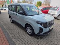 Gebraucht Ford Tourneo Courier Trend 125 PS (91 kW) 2024 Cactus gray Van / Kleinbus