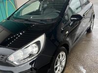 Gebraucht Kia Rio 109 PS (80 kW) 2011 Schwarz Kleinwagen