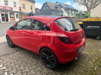 Używany Opel Corsa 101 KM (74 kW) 2013 Czerwony Hatchback