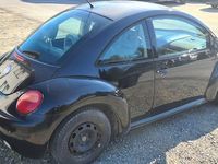 Gebraucht VW New Beetle 75 PS (55 kW) 2002 Schwarz Kleinwagen