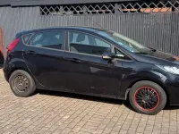 Gebraucht Ford Fiesta 95 PS (69 kW) 2012 Schwarz Limousine