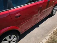 Second-hand Opel Meriva 105 CP (77 kW) 2006 Roșu Monovolum