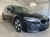 Gebraucht BMW 520 190 PS (139 kW) 2023 Black sapphire metallic Kombi
