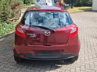 Gebraucht Mazda 2 75 PS (55 kW) 2012 Rot Kleinwagen
